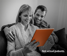 Couple looking at manual Couple looking at manual